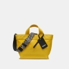 DKNY BRADY CANVAS LOGO CROSSBODY BAG - Taxi Yellow